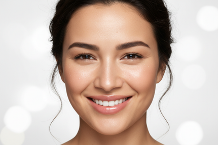woman smiling with dewy skin. Cosmetic feeling